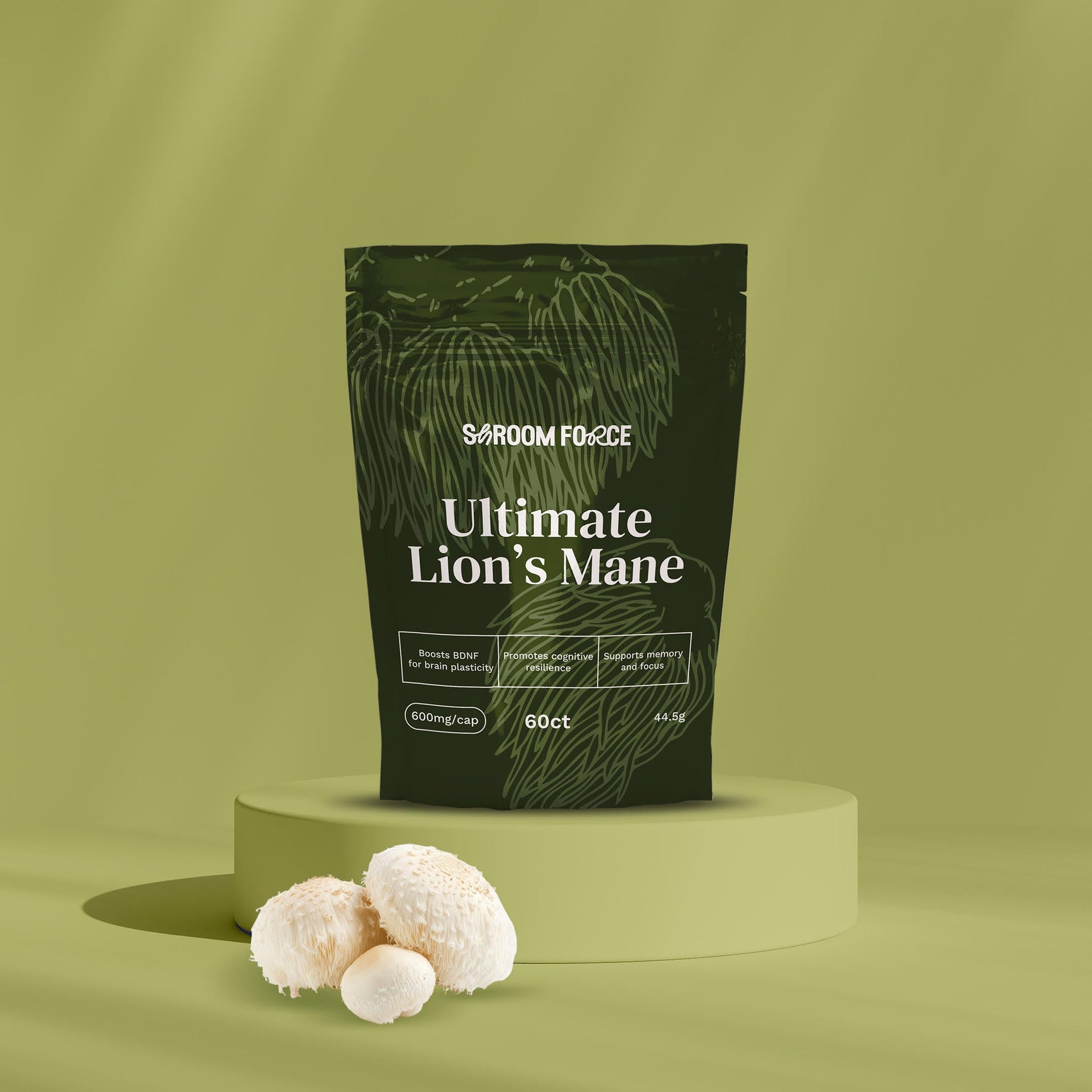 Shroom Force Ultimate Lion's Mane supplement package on a green background