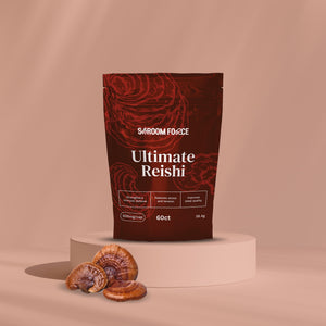 Saroom Force Ultimate Reishi package on a beige platform with reishi mushrooms on a beige background